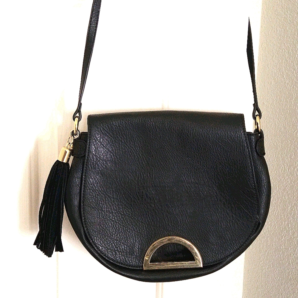 Faux leather (I think), black crossbody purse